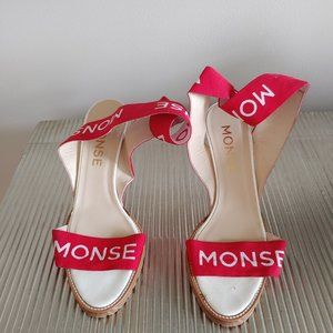 Monse white sandals with red elastic straps for ankles high heels. Size 9 1/2.